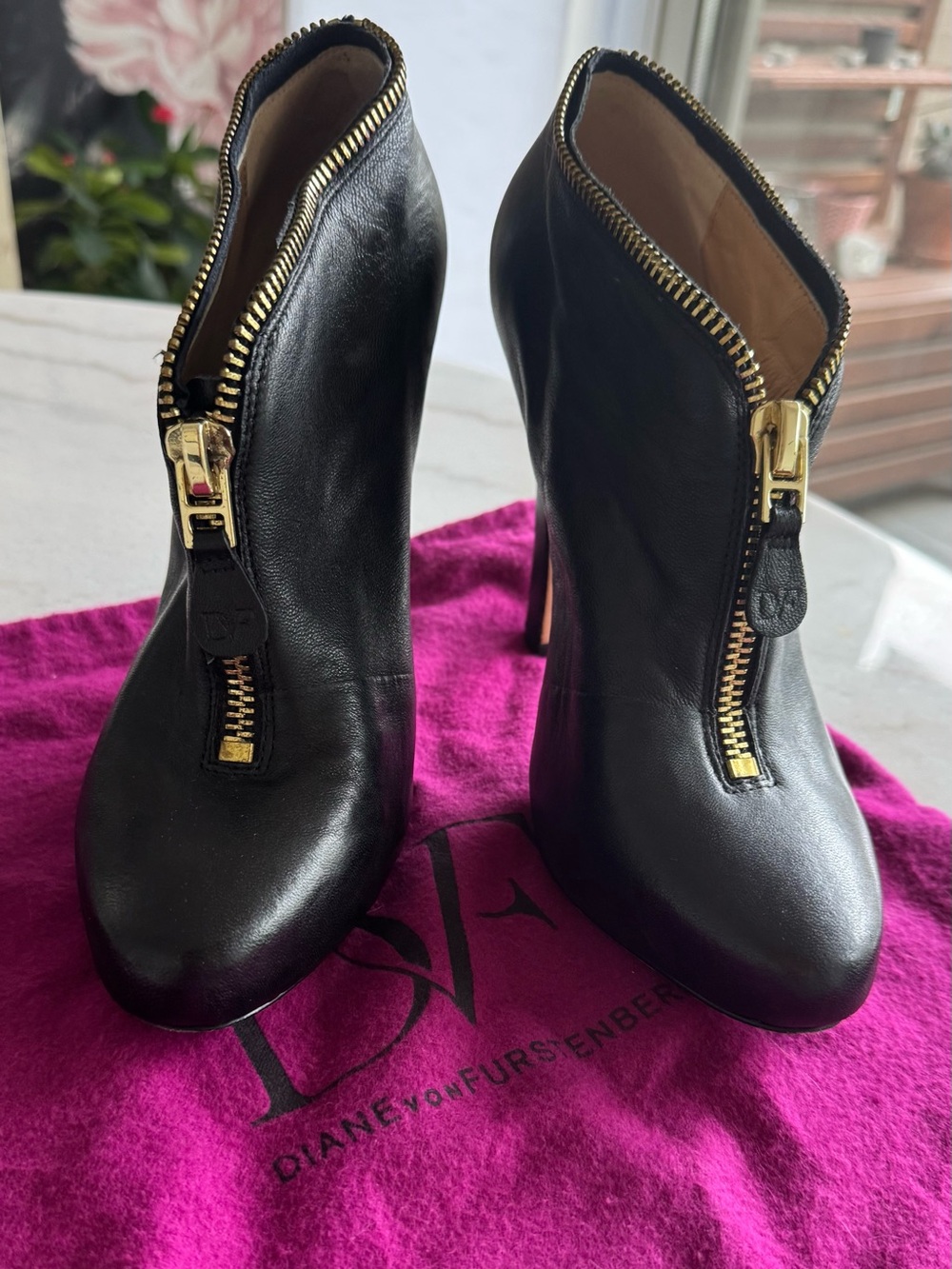 Diane Von Furstenberg Black Leather Zip-Front Ankle Booties with Gold Hardware